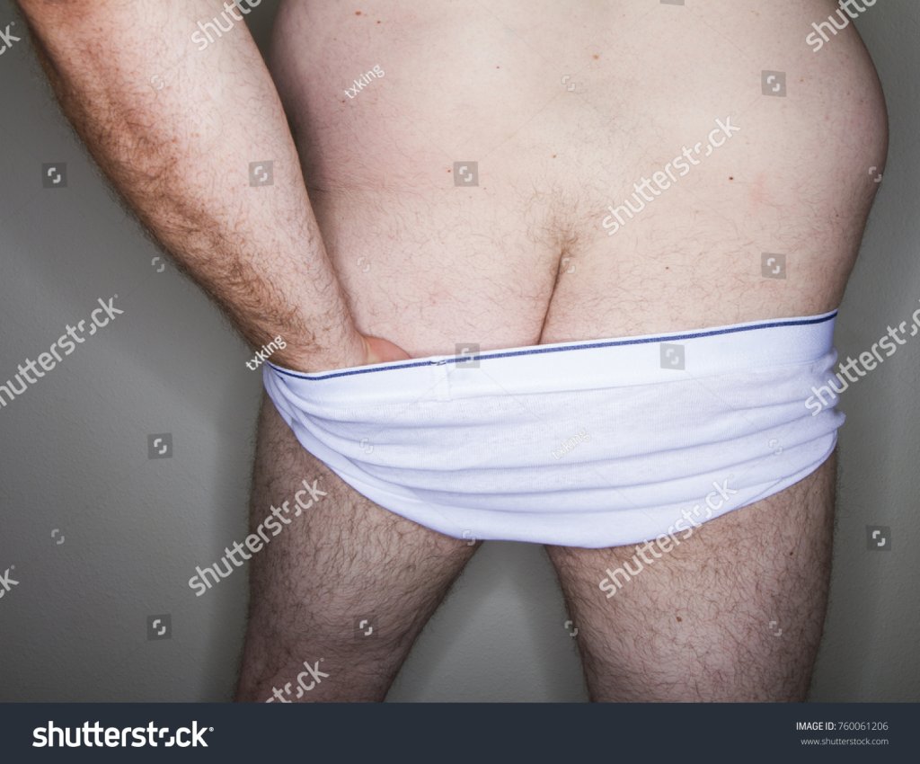 stock-photo-gross-man-scratching-his-butt-with-no-modesty-760061206.jpg