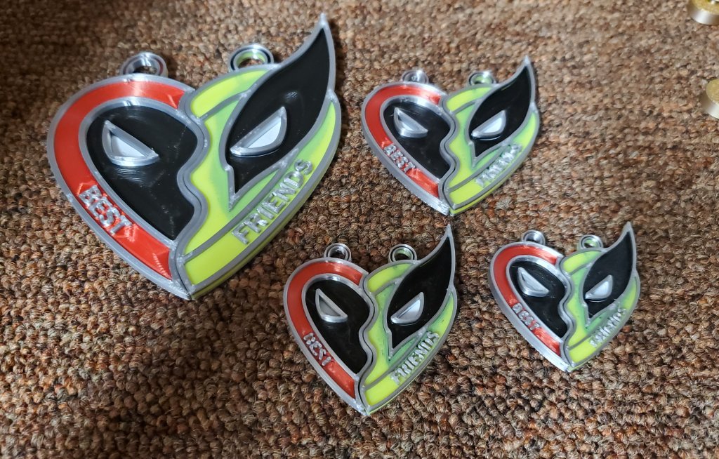 Deadpool Wolverine pendants